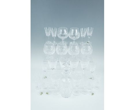 Waterford Crystal Lismore pattern decanter, six brandy balloons, six large wine glasses amd twelve small wine glasses