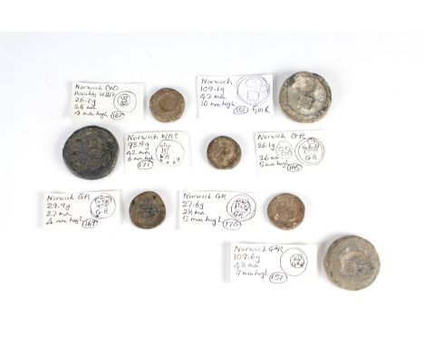 Seven 17th / 18th Century lead trade weights, variously marked with a crowned W, 'GR', 'G II R', 'G III R', and an Armorial f