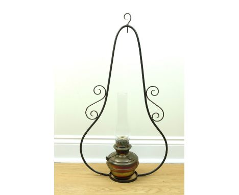 A 20th Century brass and wrought iron hanging oil / harp lamp, 86 cm