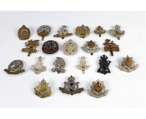 A group of British army cap badges
