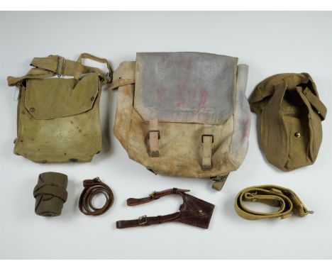 A British army 1918 dated Webbing Lewis machine gun magazine pouch, a Sam Browne sword frog, a leather lanyard, a Pattern 193