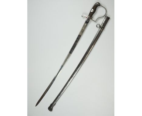 An Imperial German army artillery officer's dress sword, having a heavily etched and blued blade incorporating its original o