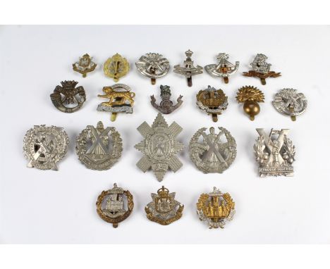 A group of British army cap badges