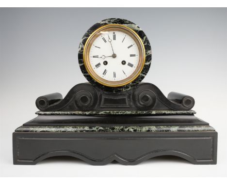 A Victorian marble mantle clock, having a two train drum movement striking on a bell in a black and vert marble case, (not ru