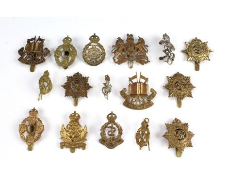 A small group of British army corps cap and collar badges