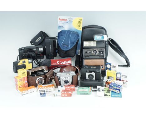 A group of vintage cameras, including a Kodak EK300 instant camera, a Beinette Junior II etc, together with camera bags and a