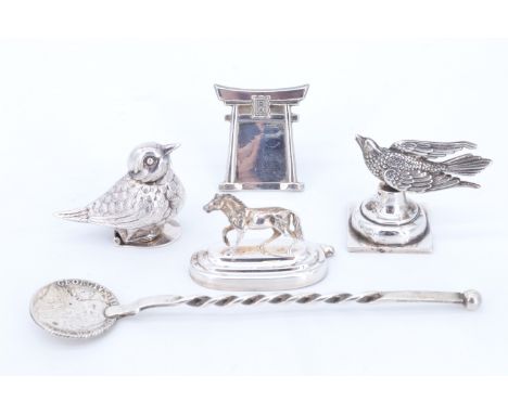 Three Victorian and later novelty place card holders, in the forms of a horse, a flying pheasant, and a Japanese Torii gate, 
