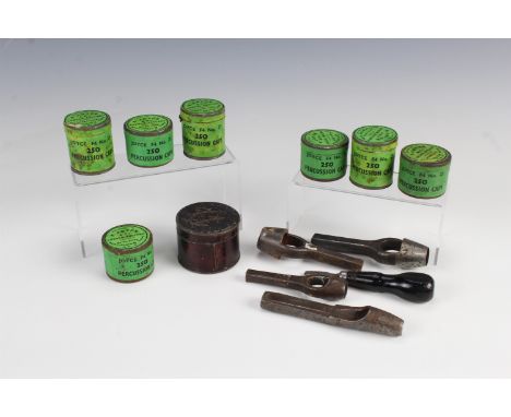 A quantity of Joyce percussion cap tins together with a turnscrew and patch / wad cutters by Dixon and others