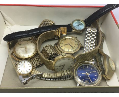 Two vintage Swiss watches comprising a Dugena and an Eternamatic plus other watches.