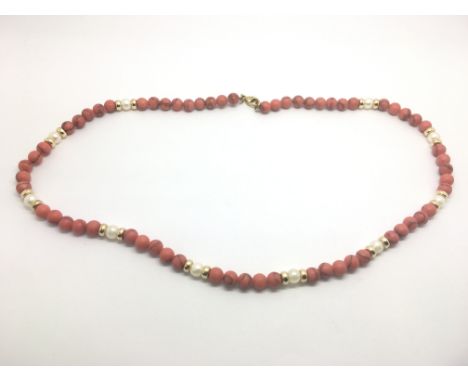A 9ct gold, coral and pearl necklace.