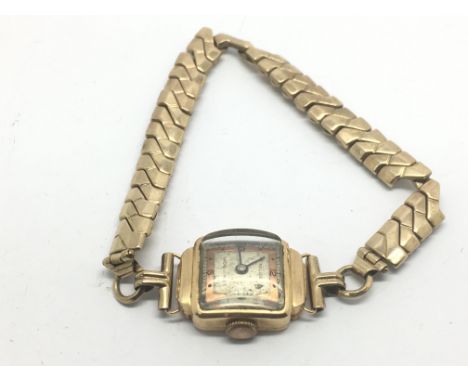 A vintage 18ct gold cased watch on a 9ct gold expanding bracelet, approx 17.5g.
