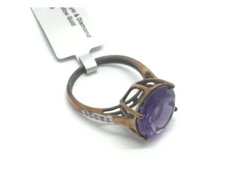 A 9ct gold, amethyst and diamond ring, approx 3.7g and approx size M-N.