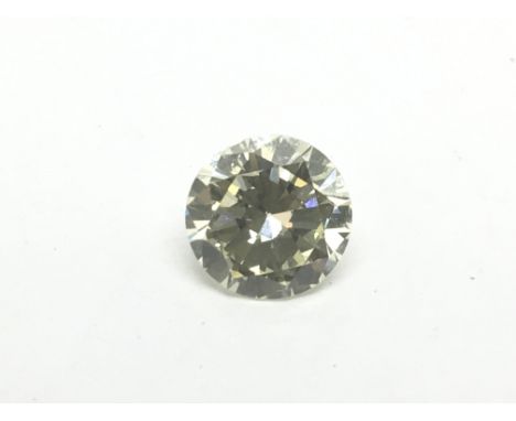A large round brilliant cut diamond, approx 2.66ct, colour Y-Z, clarity S12. White metal ring mount included. IDRC report inc