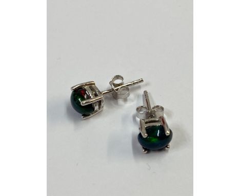 Pair of silver studs set with black Ethiopian opal