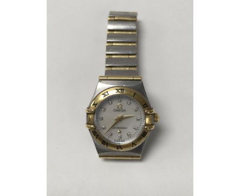Ladies Omega Constellation wrist watch in stainless steel and rose gold, with a diamond and mother of Pearl face.