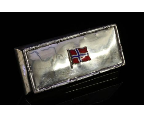 An Edwardian silver rectangular bombe shaped box, hinged cover applied with an enamel Norwegian flag, 11cm wide, Chester 1908