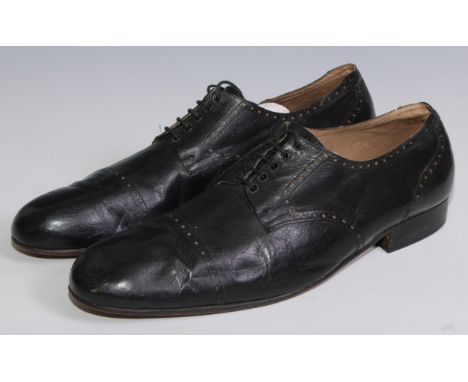 Giantism and Vintage Clothing - a pair of early 20th century oversize black leather Oxford shoes, 38cm long 