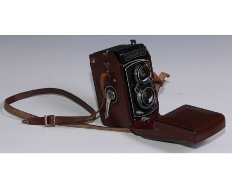 Photography - a Rolleiflex twin lens camera, Synchro Compur, serial number 1421042, leather case 