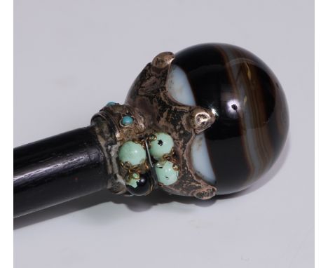 An early 20th century silver coloured metal mounted banded agate and turquoise mounted walking stick, globular pommel, ebonis