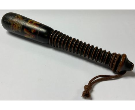 A Victorian truncheon, painted and gilt with crown over V.R cypher, ebonised, ring turned handle, 26.5cm long 