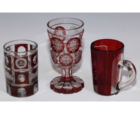 A Bohemian ruby overlaid glass spa beaker, etched with named views of Altenberg and other landmarks, 11.5cm high, c.1900; oth