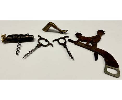 Erotica - an Art Deco period bakelite novelty automaton pistol-form bottle opener, pat. no. 242871, 18cm long; another; a nov