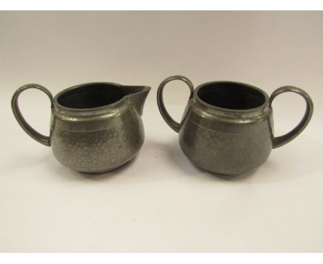 A Liberty Tudric pewter jug and sugar bowl