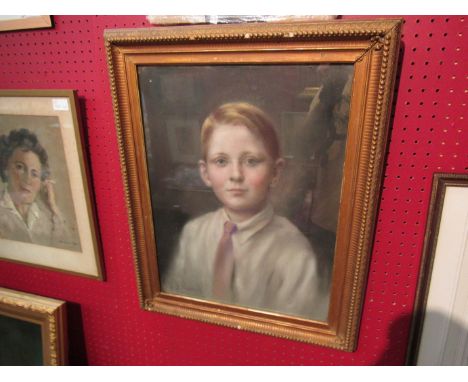 A pastel portrait of young boy, indistinctly signed lower left, gilt framed and glazed, 46cm x 34cm