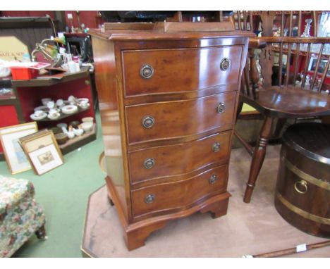 A Georgian style serpentine front chest of small proportions the four drawers on bracket feet, 74cm x 46cm x 35cm