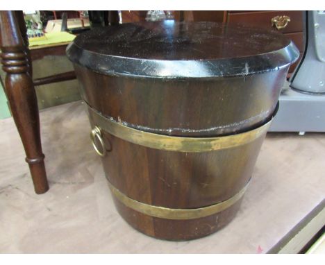 A Drummond Woodware mahogany coal/stick bucket, with brass banding and twin handles, 36cm tall