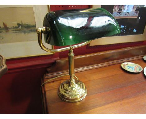 A green glass bankers lamp