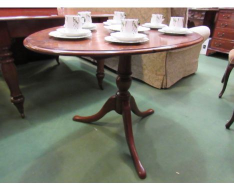 A mid Victorian burr walnut oval tilt top table on turned column and tripod base, 103cm x 71cm x 69cm    