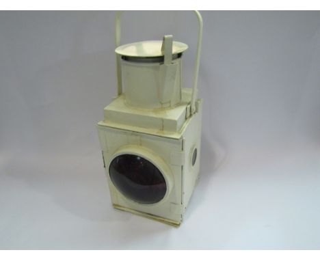 A bygone railway lamp stamped BR (W)