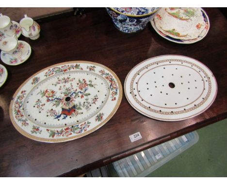 Two ceramic drainers including floral design example