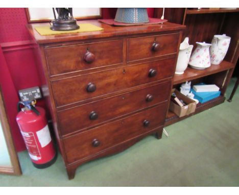 A 19th Century mahogany two over three chest of drawers with bun handles and bracket feet, 101cm x 92cm x 47cm