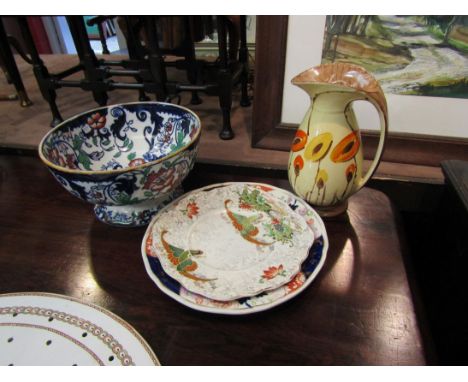 A Japanese ironstone bowl, two similar plates including Masons and a Myott jug (4)