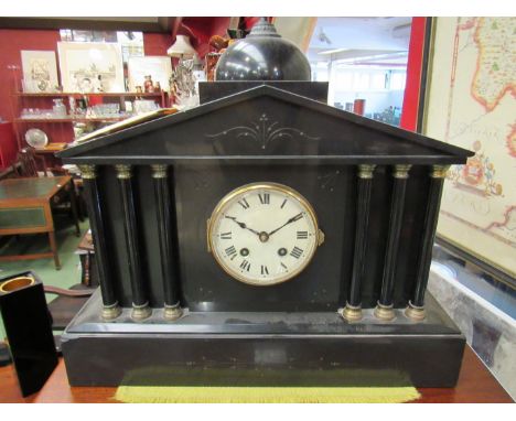 A Victorian black slate mantel clock of architectural form, with key, 40cm tall