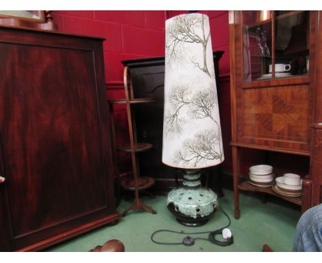 A West German pottery table lamp with tall tree design shade