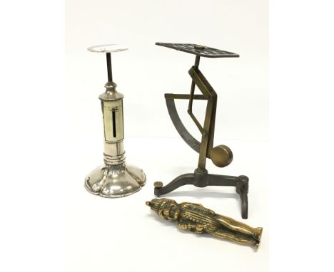 An early 20th century silver letter weighing scale together with a balance letter weighing scale and a pair of brass Mr. & Mr