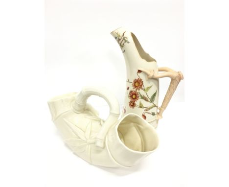 A Royal Worcester tusk jug with simulated horn handle decorated with flowers on cream ground (printed cipher and Bee mark to 