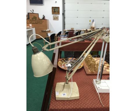 A large mid 20th century Industrial cream painted angle poise desk lamp.