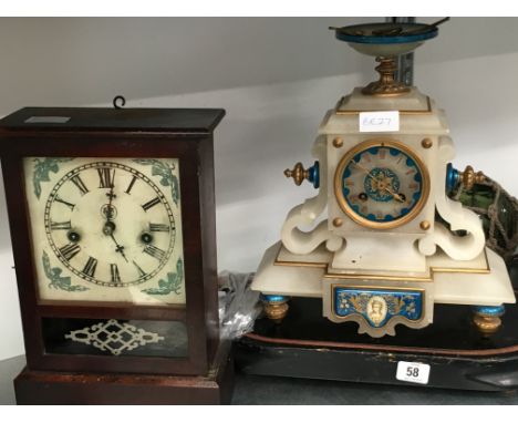 A late 19th century alabaster mantle clock on wooden stand together with a small American mantle clock.
