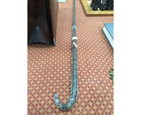 A Nailsea style glass walking stick.