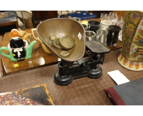 A set of brass and iron scales and weights 