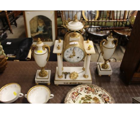 A 19th Century French marble and gilt metal clock garniture