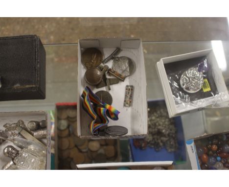 A tray containing a WW1 medal awarded to 267023 Pvt H H Dickinson; together with a WW2 medal; a half penny lighter etc.