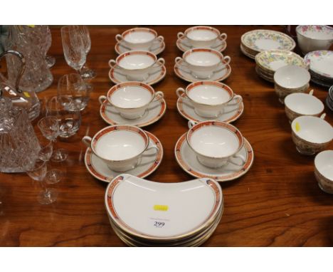 A Royal Worcester "Beaufort" set of eight soup bowls on stands; and six hors d'oeuvres dishes 