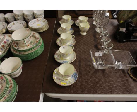 A set of six each Foley china Art Deco coffee cups and saucers and matching cream jug 