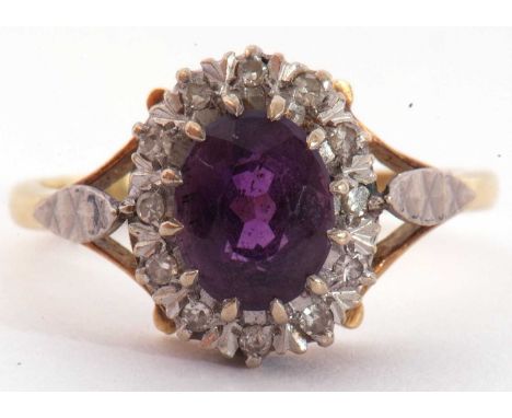 Amethyst and diamond cluster ring, the oval faceted amethyst raised within a small single cut diamond surround, stamped 18ct,