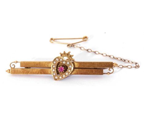 Antique 15ct gold heart shaped ruby and seed pearl brooch, the offset heart applied to twin plain polished bead decorated bar